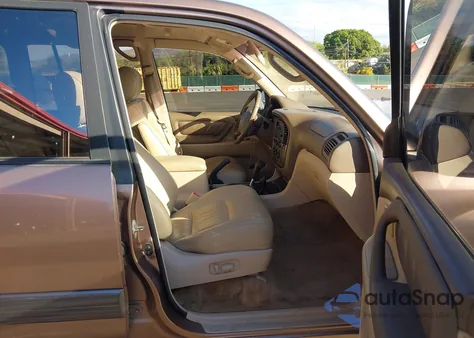 1999 Toyota Land Cruiser from USA, damaged, VIN JT3HT05J4X0056193